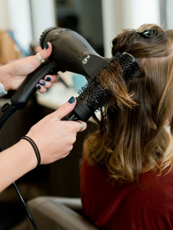 Blow-drying with a round brush